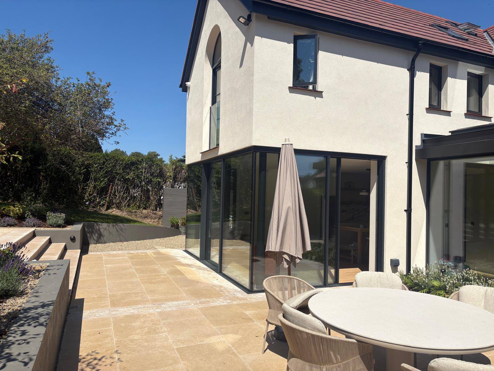 Completed Abcon Construction project: terrace and glazed rear elevation