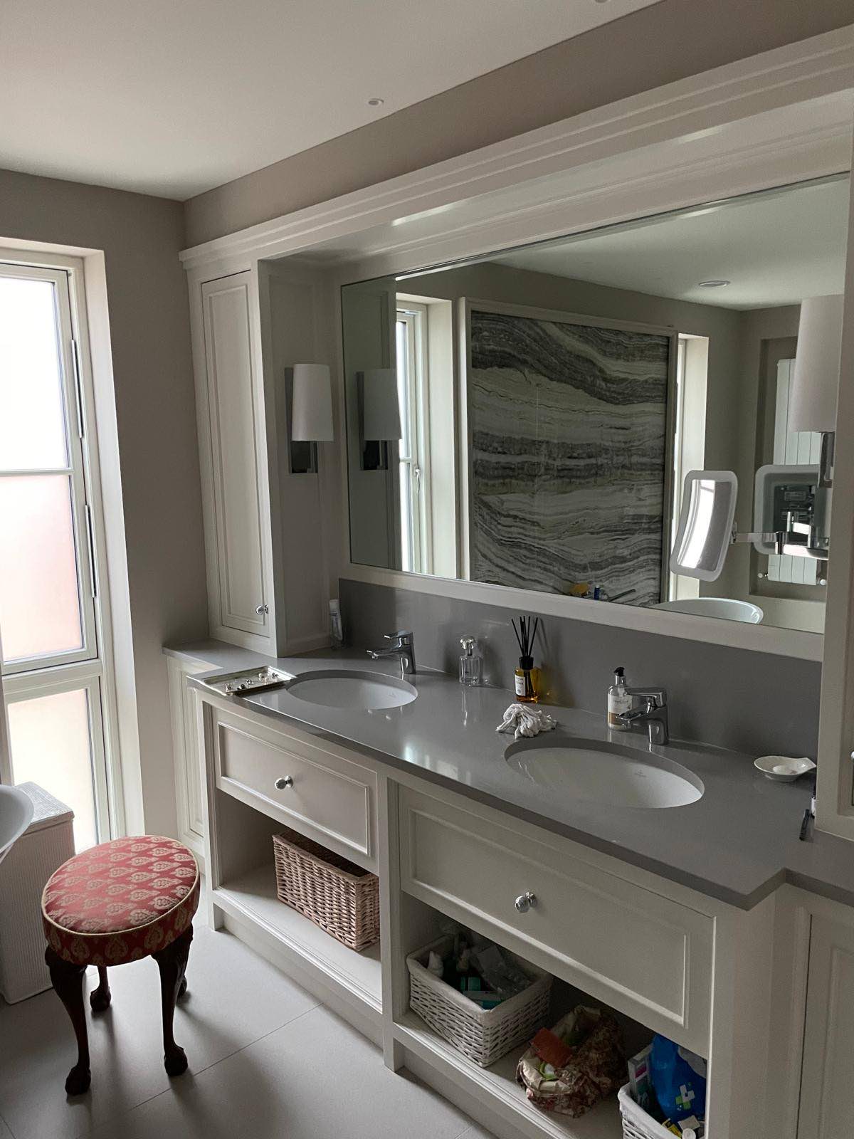 Twin vanity in stone with fitted joinery