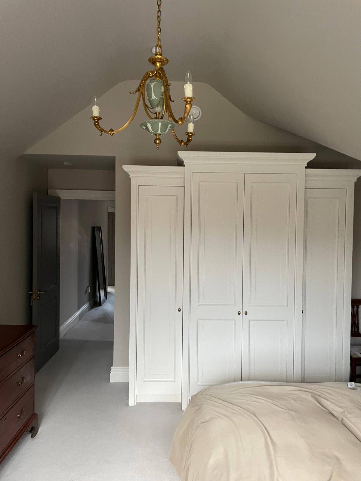 Fitted bedroom joinery under the eaves