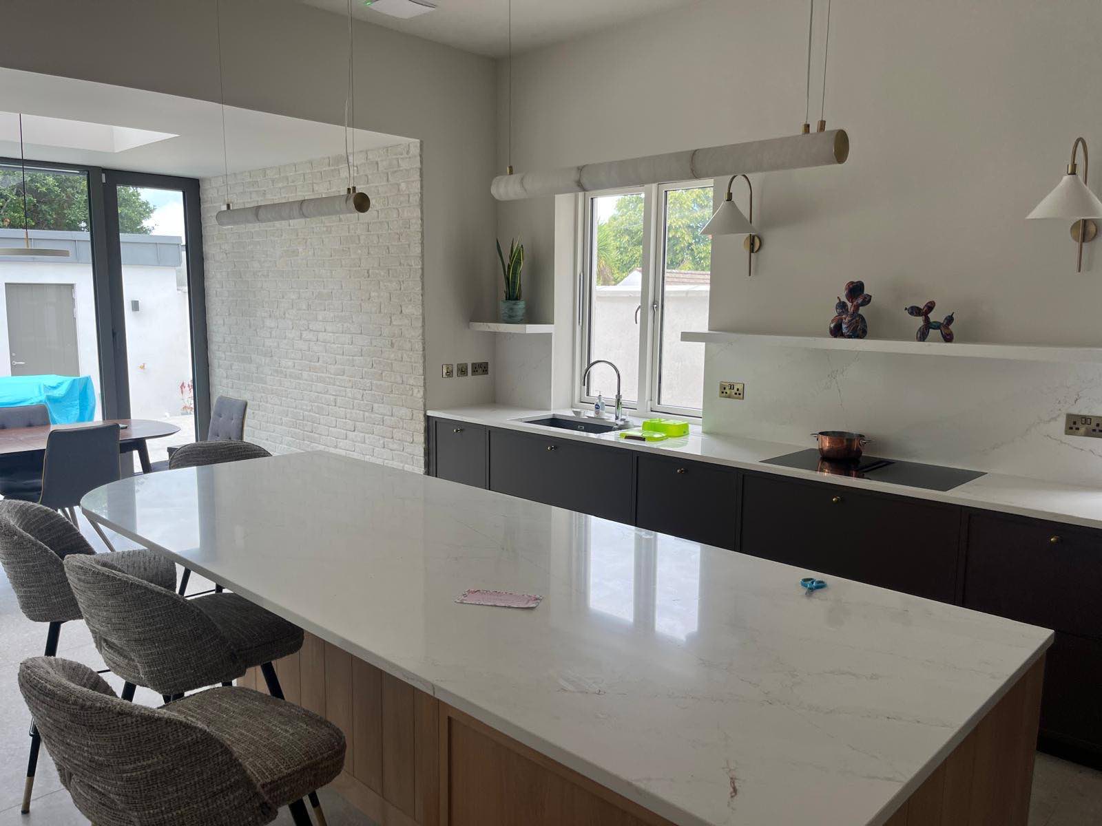 Kitchen island and rear glazing in a completed renovation