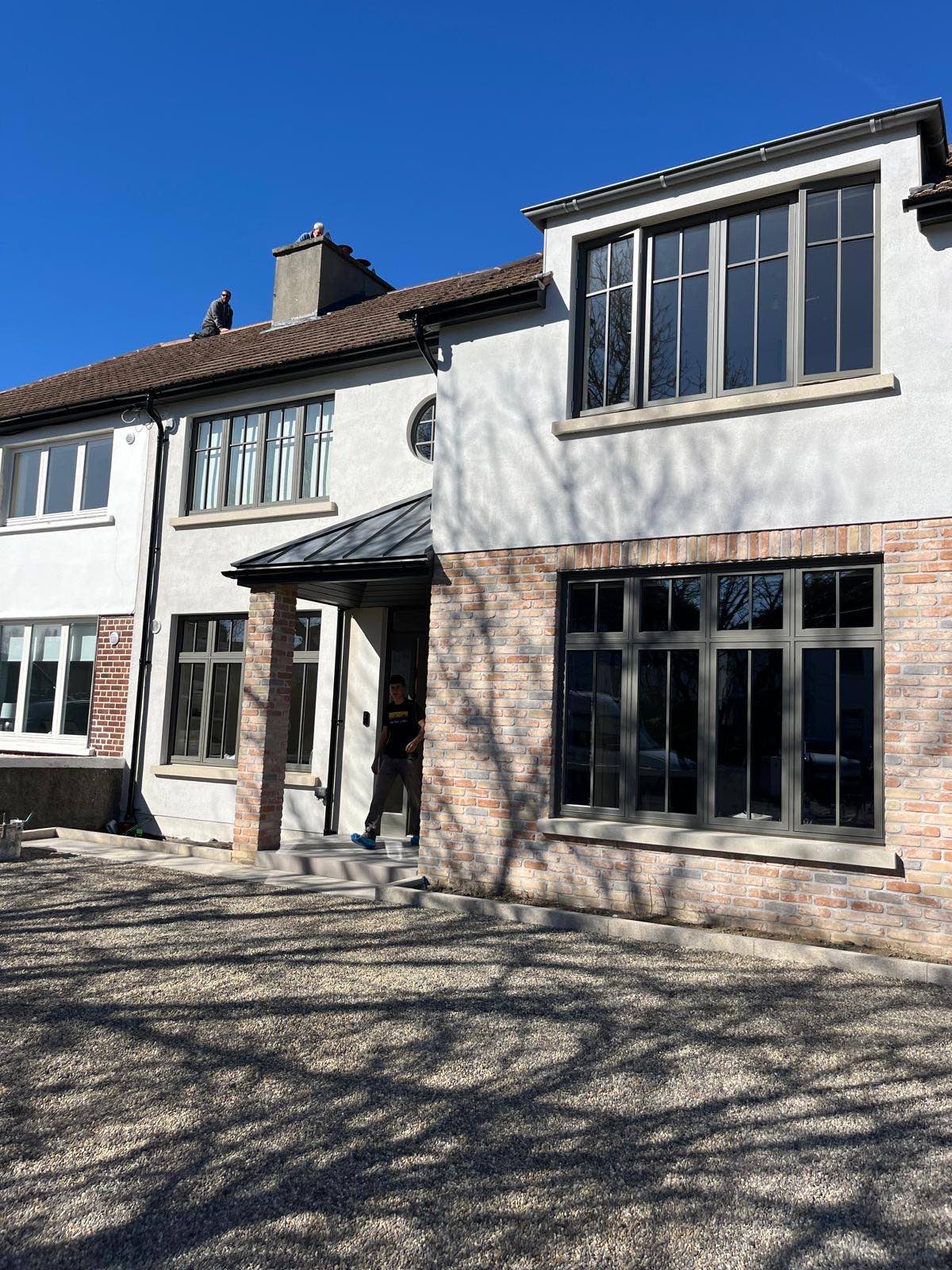 Completed elevation with new windows throughout