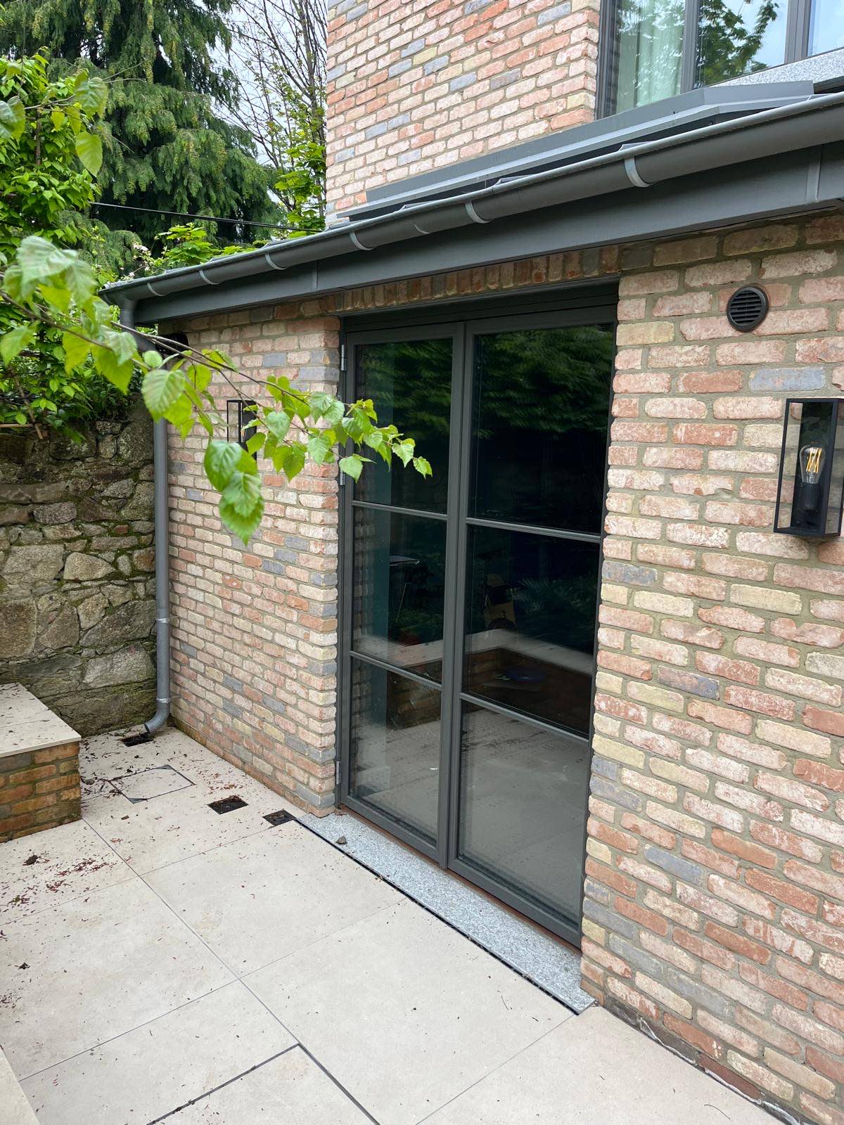 Sliding doors from the living space to the courtyard